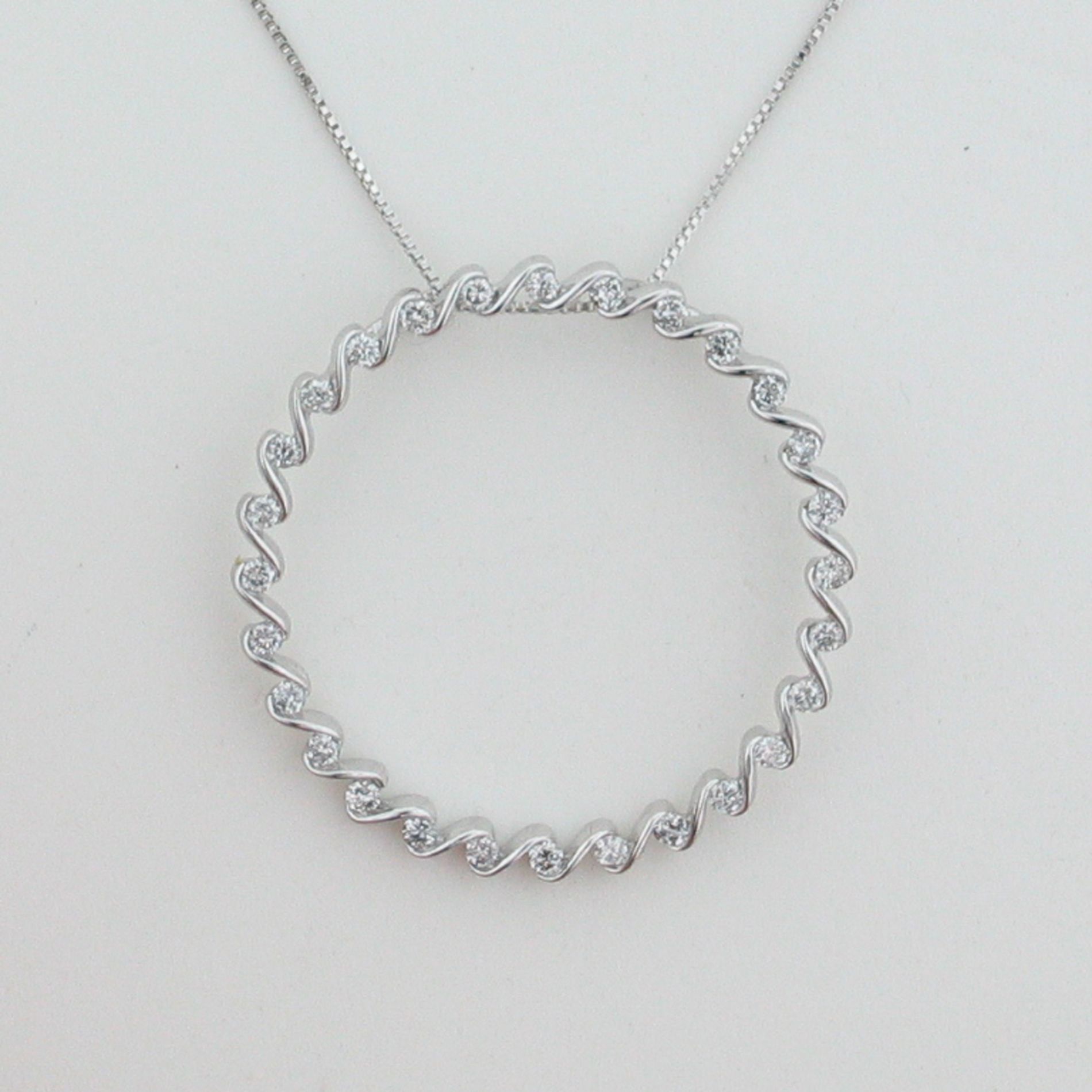1/4 cttw Diamond Circle Pendant. 10kt White Gold at mygofer.com