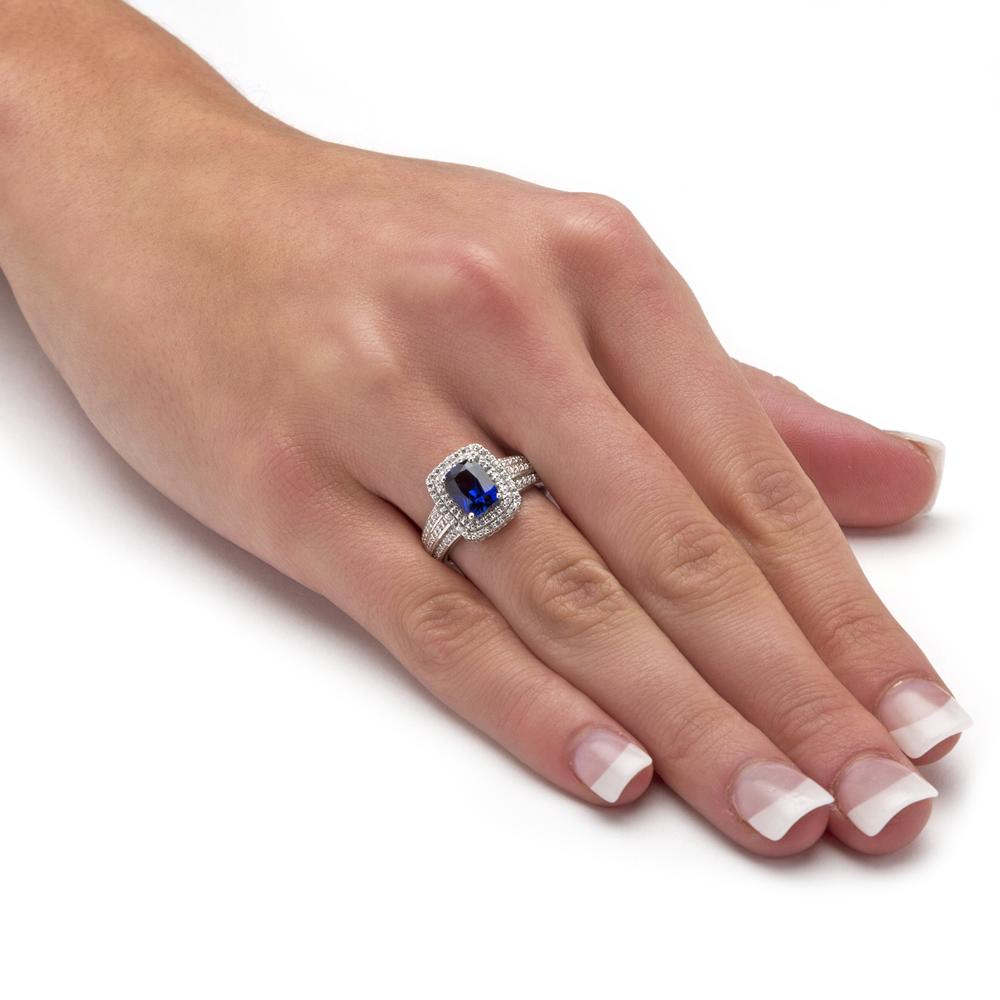 1.94 TCW Emerald-Cut Midnight Blue Sapphire and Round Cubic Zirconia Ring in Platinum over Sterling