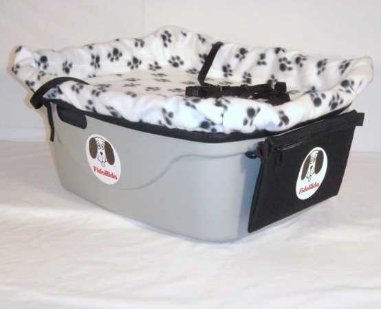 FidoRido gray two-seater with light-weight fleece in white with black paw prints and a medium harnes dog kennel