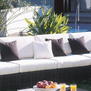 Hospitality Rattan Soho Patio Lounge Armless Chair with Cushion - Sunbrella Outdoor Fabric: Linen Silver Hospitality Rattan Soho Patio Lounge Armless Chair with Cushion - Sunbrella Outdoor Fabric: Linen Silver