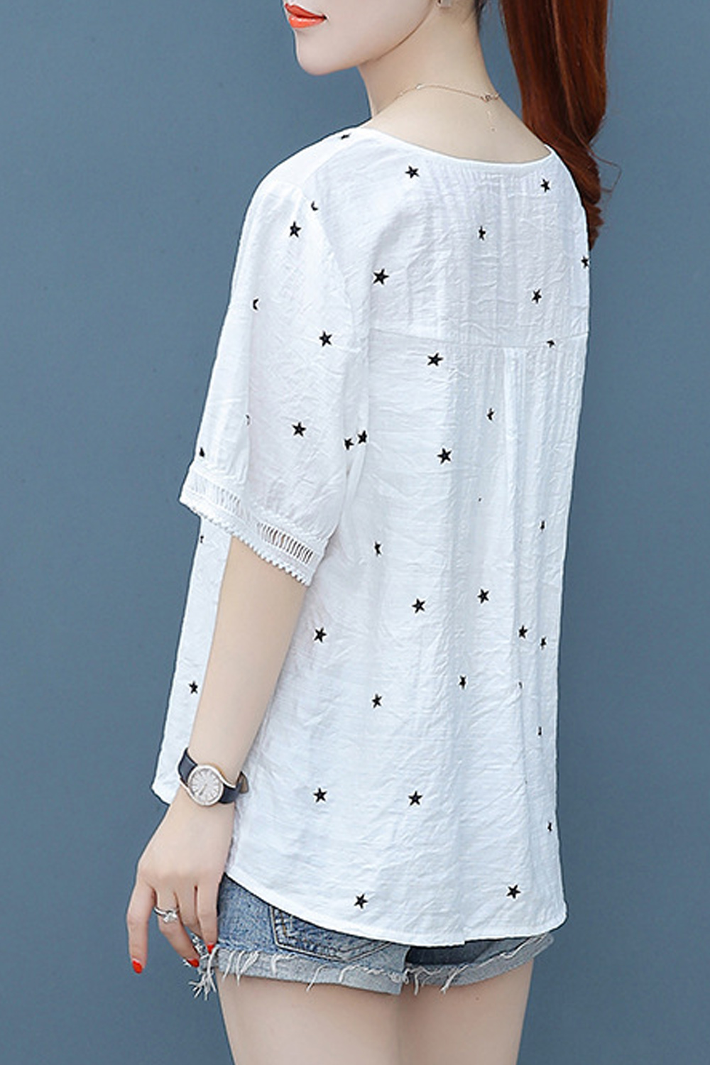 white polka dot button down shirt