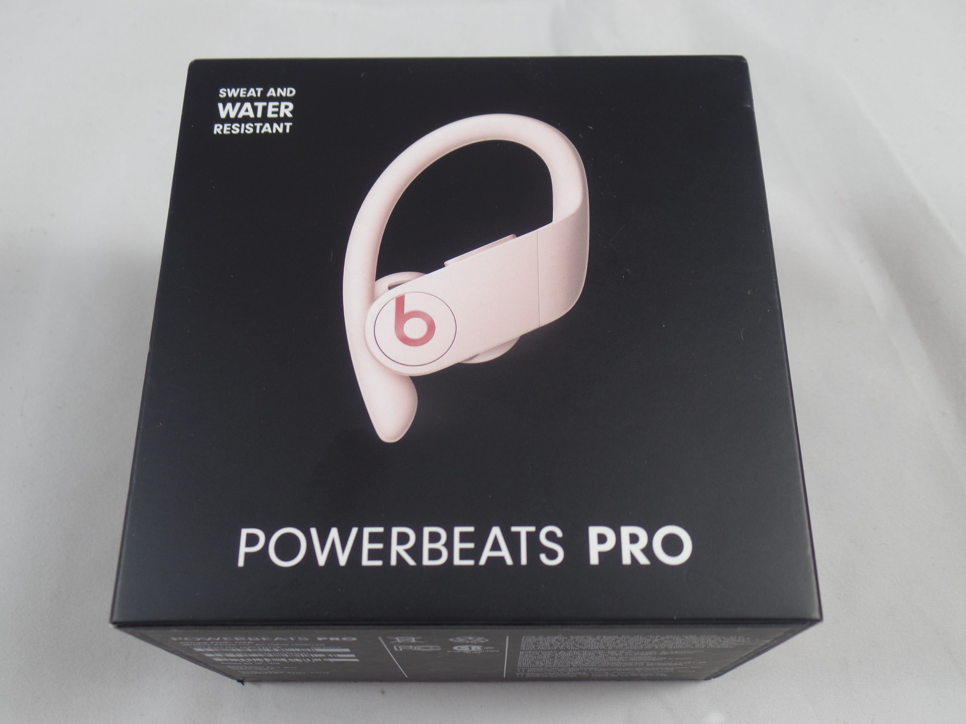 pink beats earphones