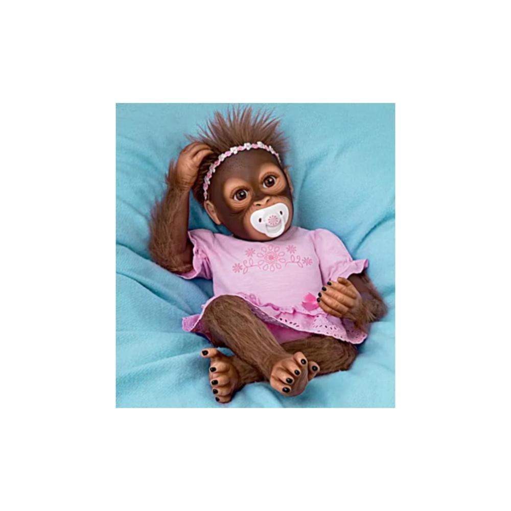 The Ashton-Drake Galleries The Ashton - Drake Galleries Cooing Cora "Coos" and “Breathes” So Truly Real® Lifelike Weighted Monkey Doll 18"
