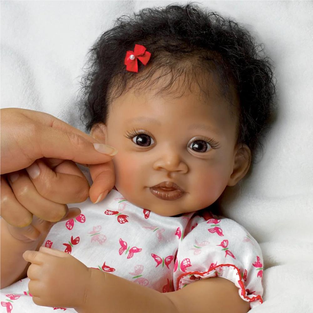 The Ashton-Drake Galleries The Ashton - Drake Galleries Sweet Butterfly Kisses Coos At Your Touch So Truly Real® Interactive Doll by Waltraud Hanl 19"