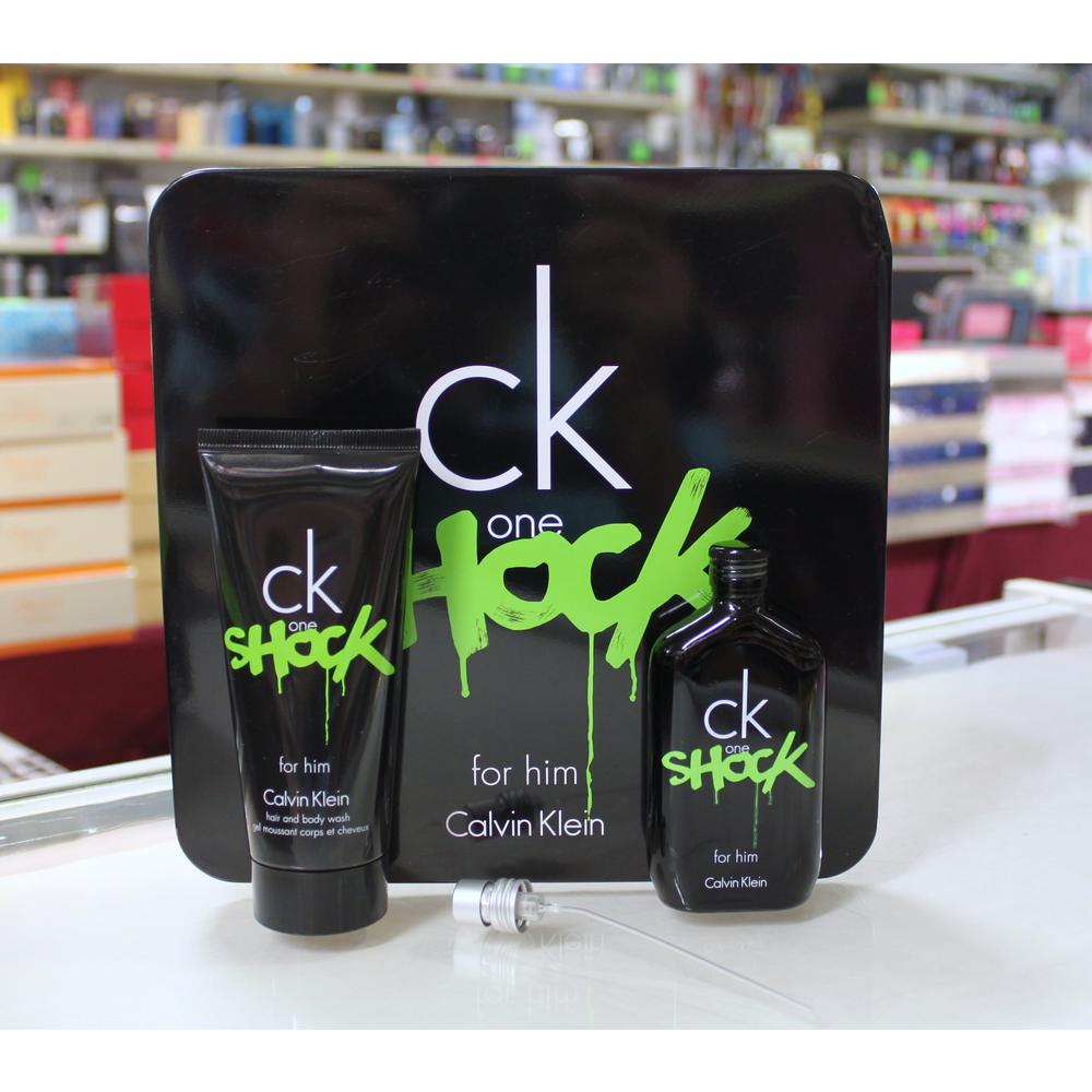 CK One Shock by Calvin Klein 2-pcs Set for Men   / 50 ml Eau De  Toilette Spray +   / 100 ml Hair & Body Wash B
