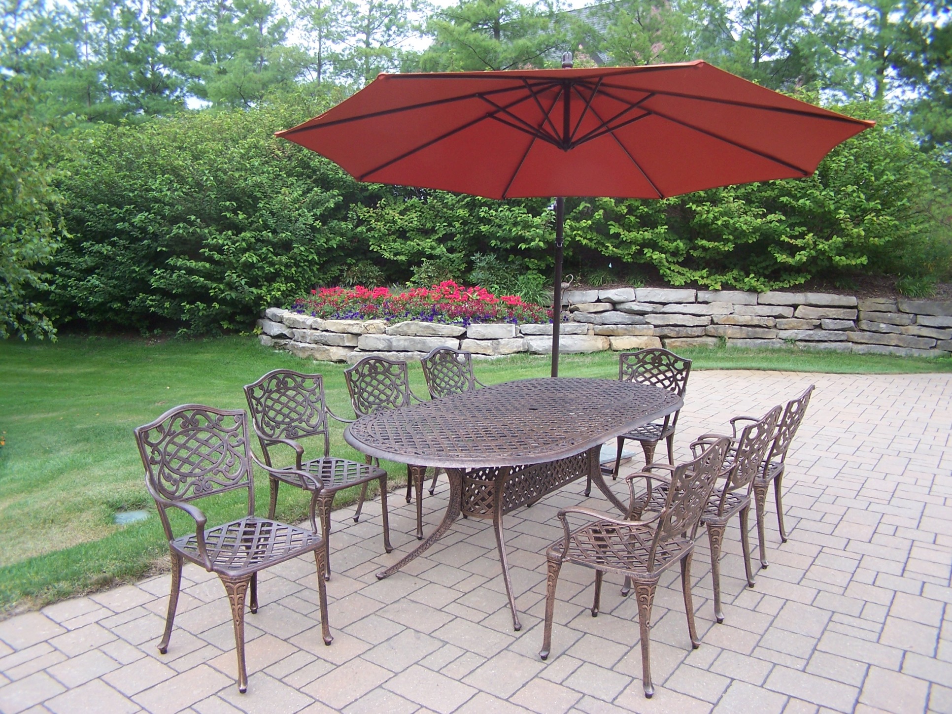Oakland Living Cast Aluminum Patio Dining set w/ 84 x 42" Oval Table, Arm Chairs, Cantilever Umbrella & Base