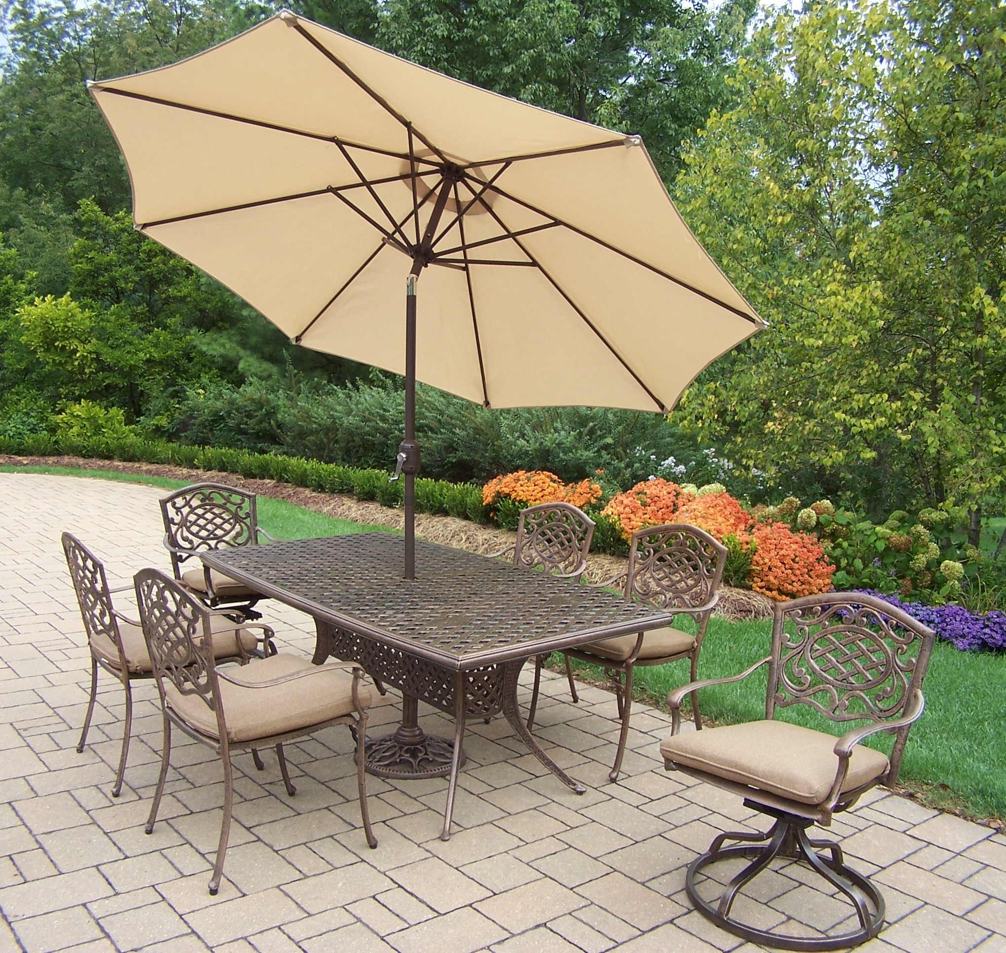 Oakland Living Cast Aluminum Patio Dining Set 70x38" Table, Cushioned Swivel Rockers& stackable Chairs, Umbrella w/ Stand