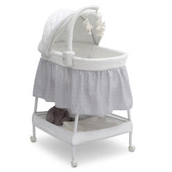 Delta Children Smooth Glide Bedside Bassinet - Portable Crib with Activity Mobile Arm Featuring Spinning Toys, Nightlight and Mu