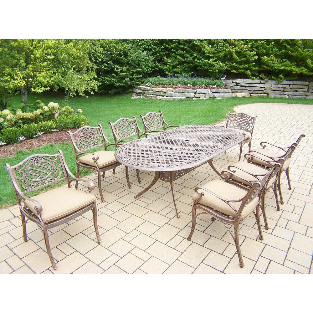 Oakland Living Cast Aluminum 9 Pc. Patio Dining set w/ 84 x 42" Oval Table & Cushioned Arm Chairs