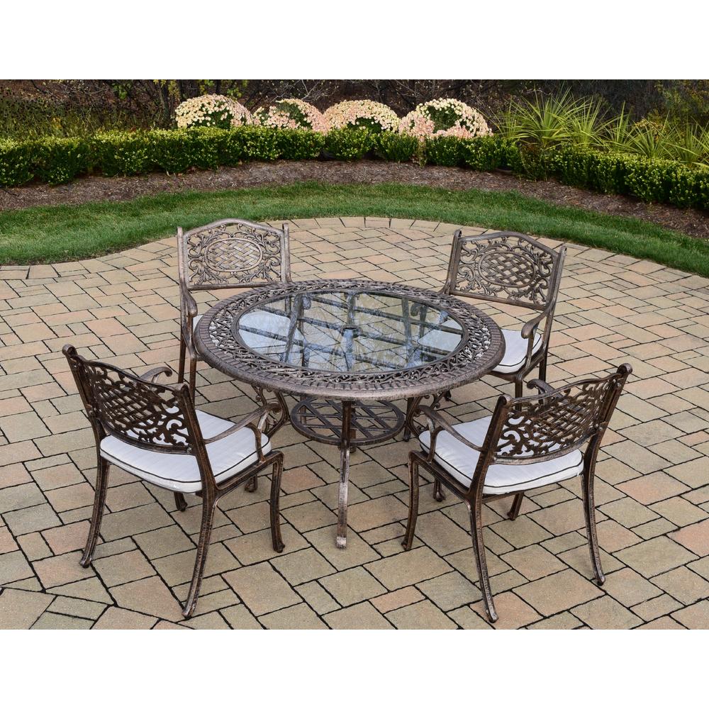 Oakland Living Cast Aluminum Patio Dining set w/ 48" Round Table & Cushioned Arm Chairs