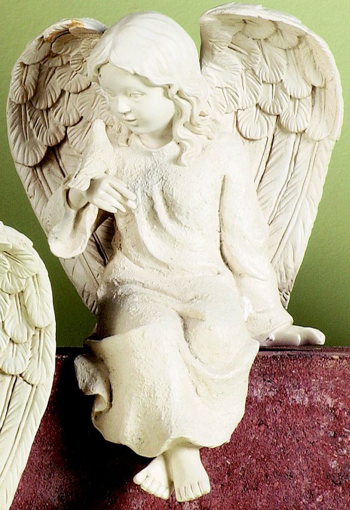 Roman 7.5 In. High Ivory Stone Seated Cherub Outdoor Figure