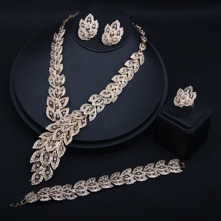 Kim Thomas 4PCS Gold Color Rhinestone Peacock Feather Necklaces Earrings Bracelet Rings Bridal Jewelry Sets Dubai Women Wedding Accessories