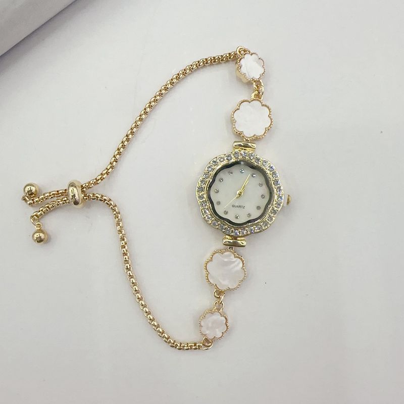 Kim Thomas Light luxury, niche temperament, diamond-encrusted flower-shaped drawstring bracelet watch