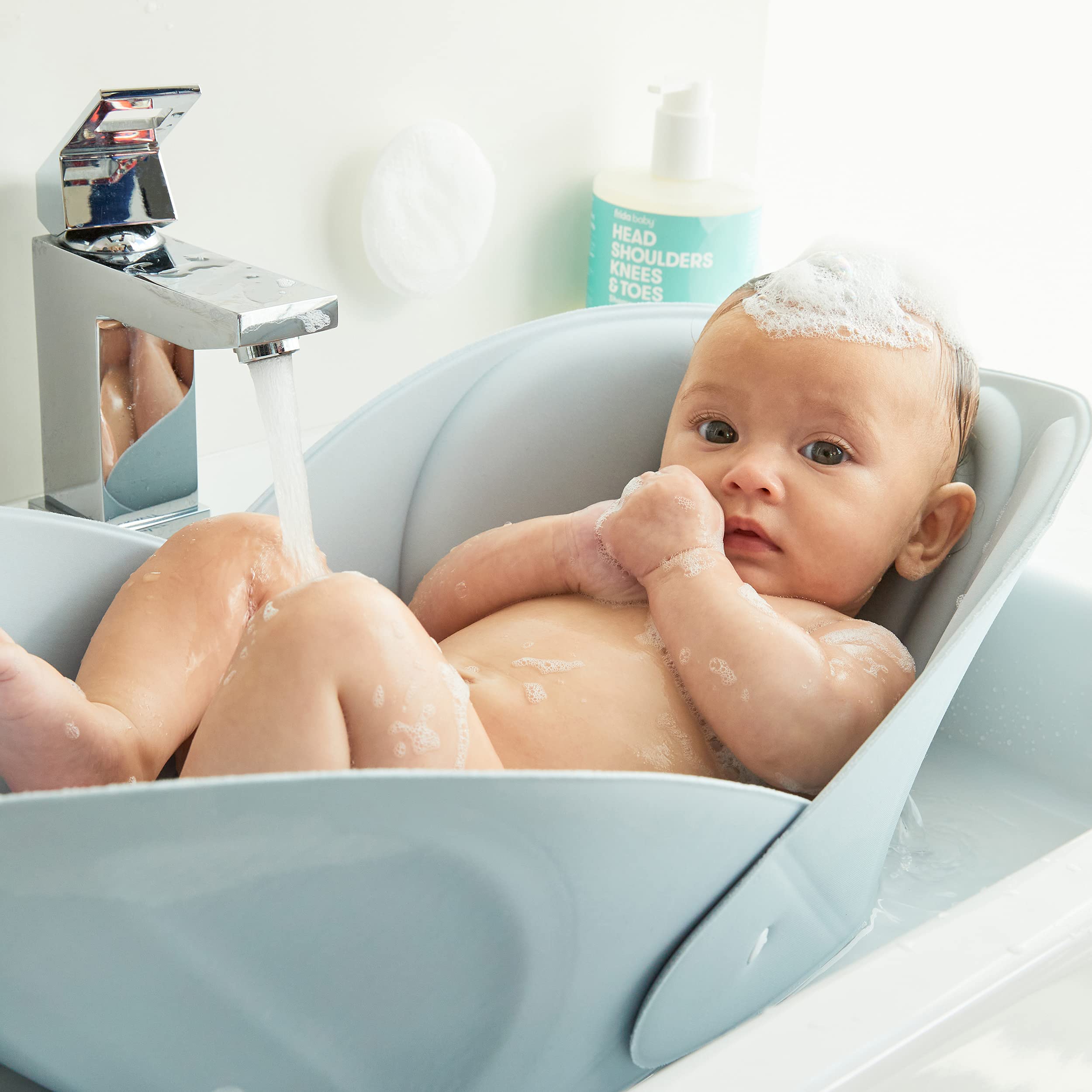 FridaBaby Soft Sink Baby Bath by Frida Baby Easy to clean Baby Bathtub + Bath  cushion That Supports Babys Head