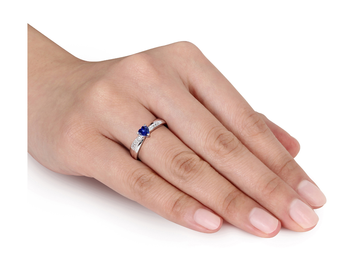 Gem And Harmony 1/4 Carat (ctw) Lab-Created Blue Sapphire Heart Ring in Sterling Silver with Accent Diamonds