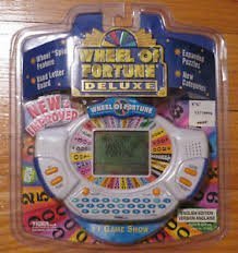 Tiger Electronics WHEEL OF FORTUNE DELUXE HANDHELD by Tiger Electronics