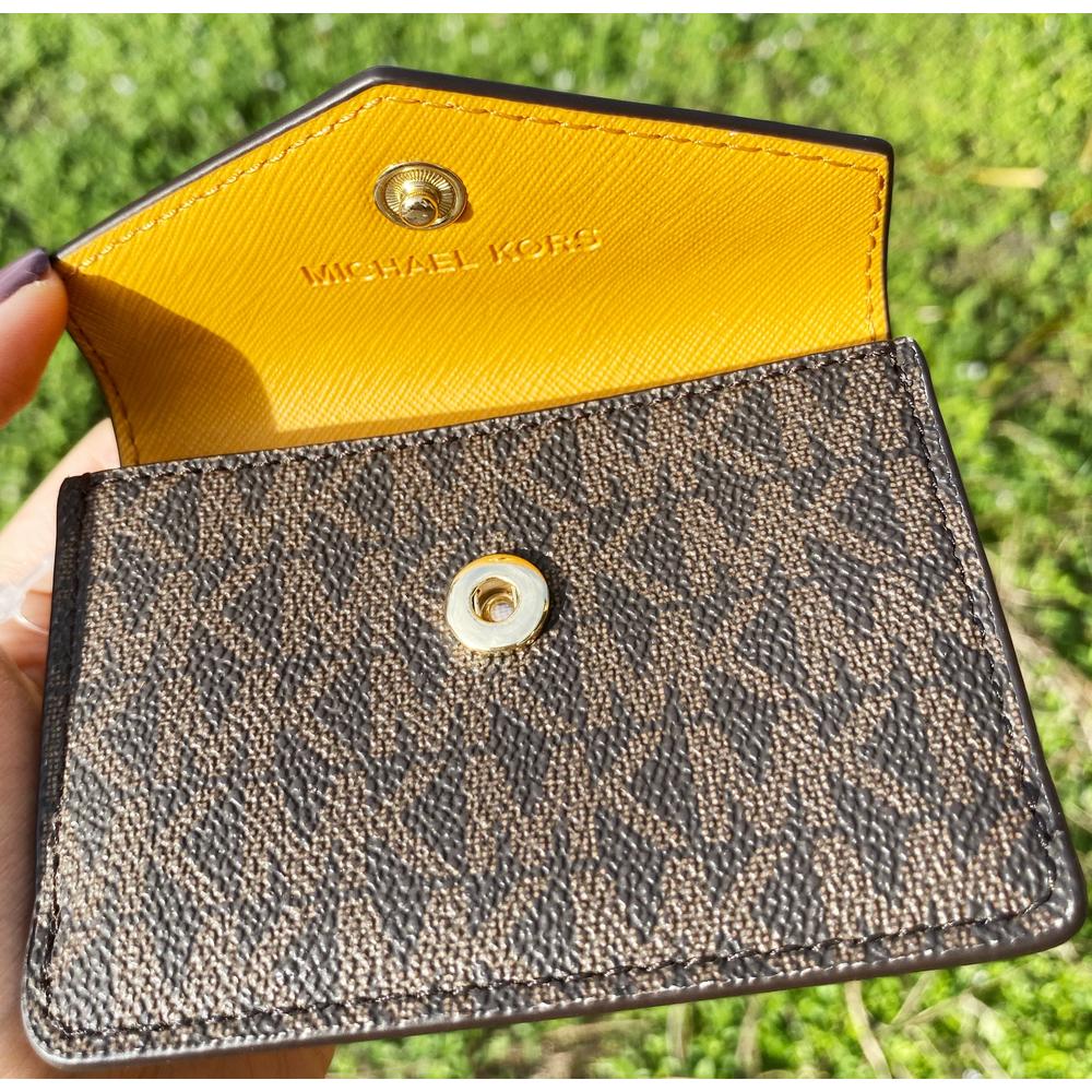 michael kors kala keychain card case brown mk signature pvc marigold leather michael kors kala keychain