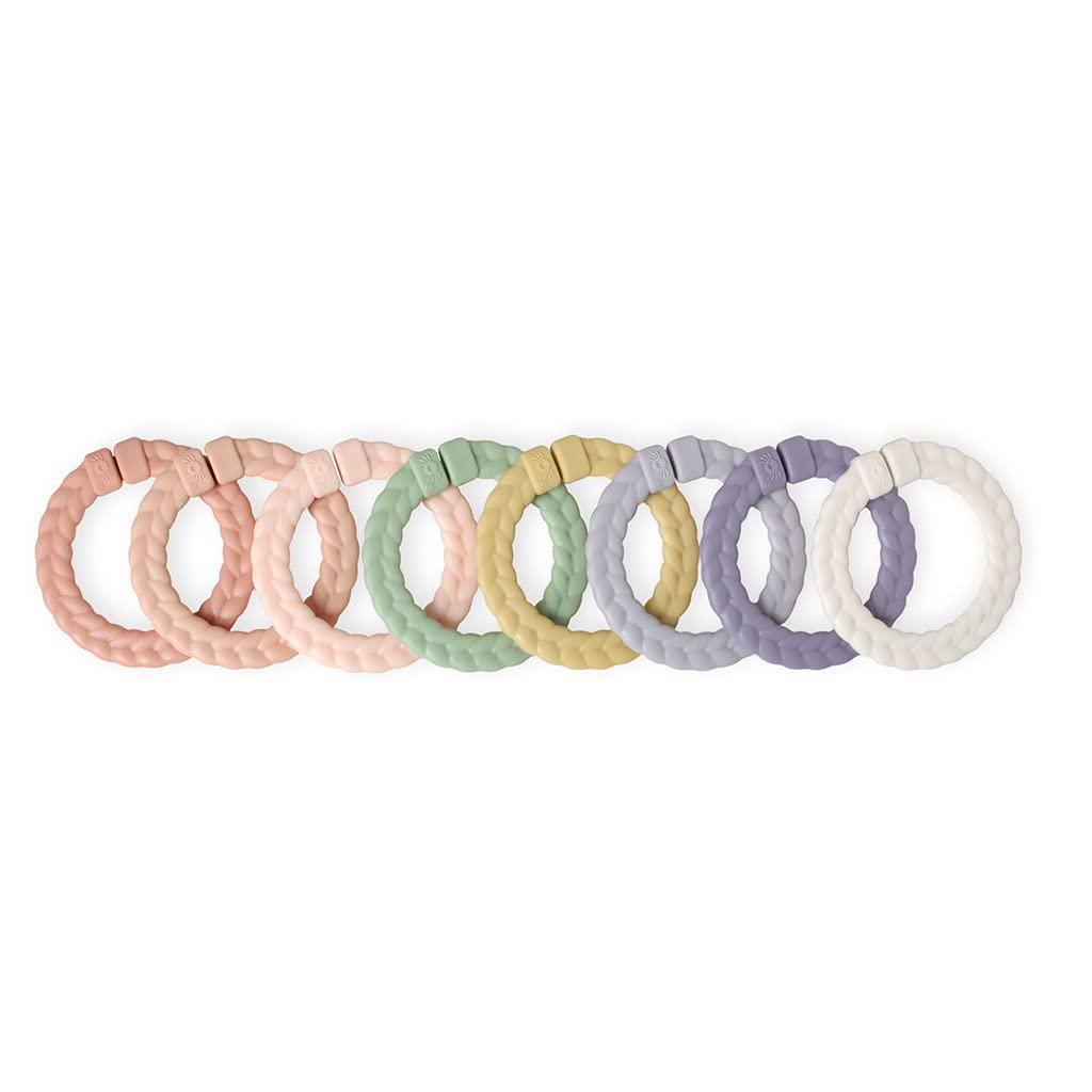 itzy ritzy linking ring set; set of 8 braided, multi-colored versatile linking rings; attach to car seats, strollers & activi