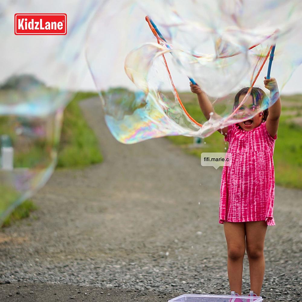 kidzlane bubble wand with 24 oz of mixed giant bubble solution | giant bubble wands for kids | outside toy big bubble maker |