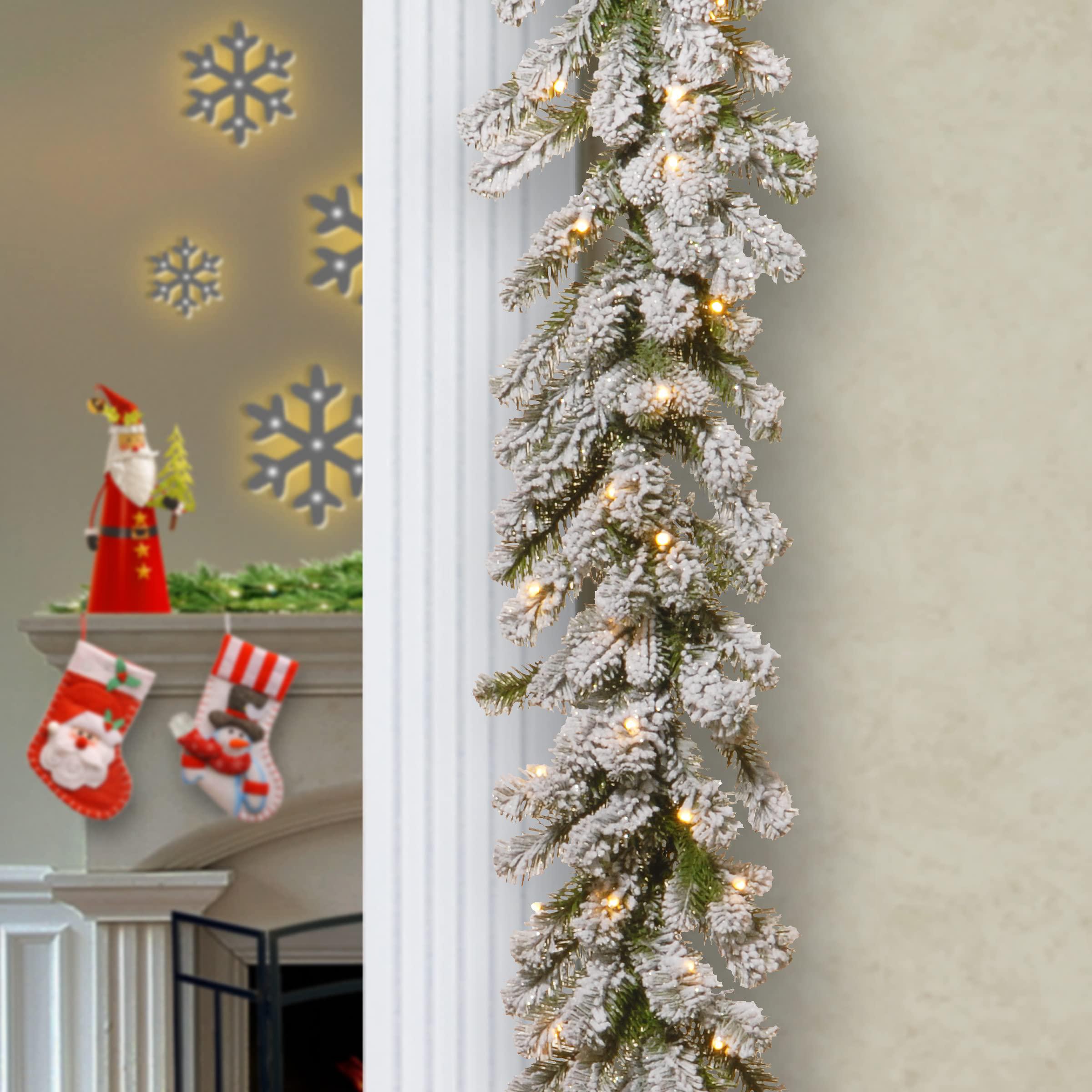 national tree company pre-lit 'feel real' artificial christmas garland, green, sheffield spruce, white lights, decorated with