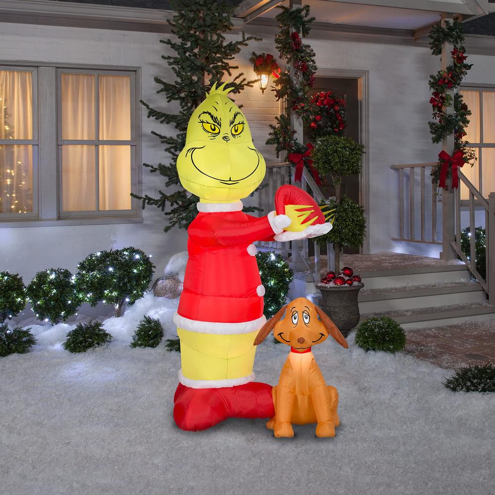 gemmy animated airblown inflatable grinch putting santa hat on max scene dr. seuss, 6 ft tall