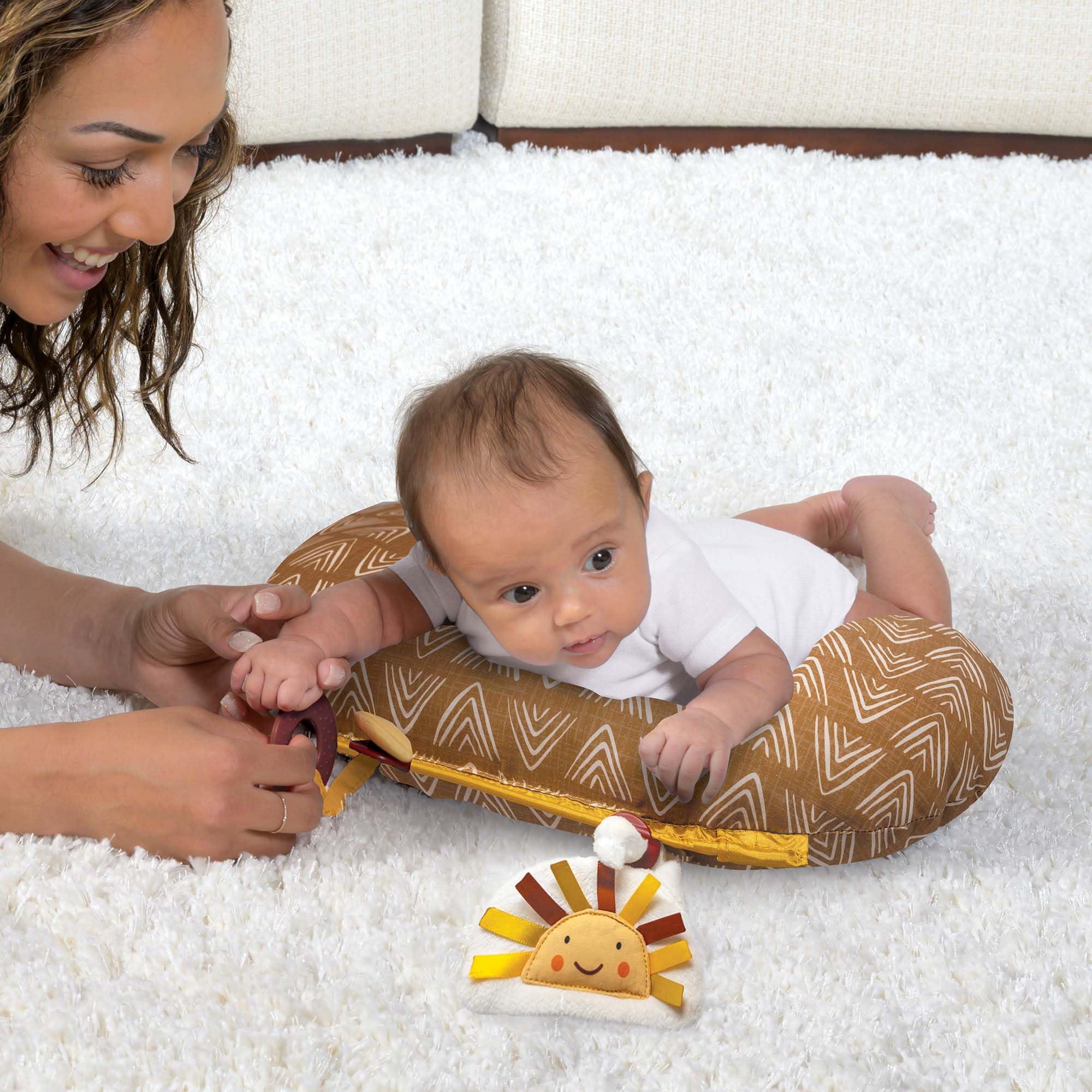 boppy tummy time prop, golden sun with arrows with two removable toys, a smaller size for comfortable tummy time, attached to