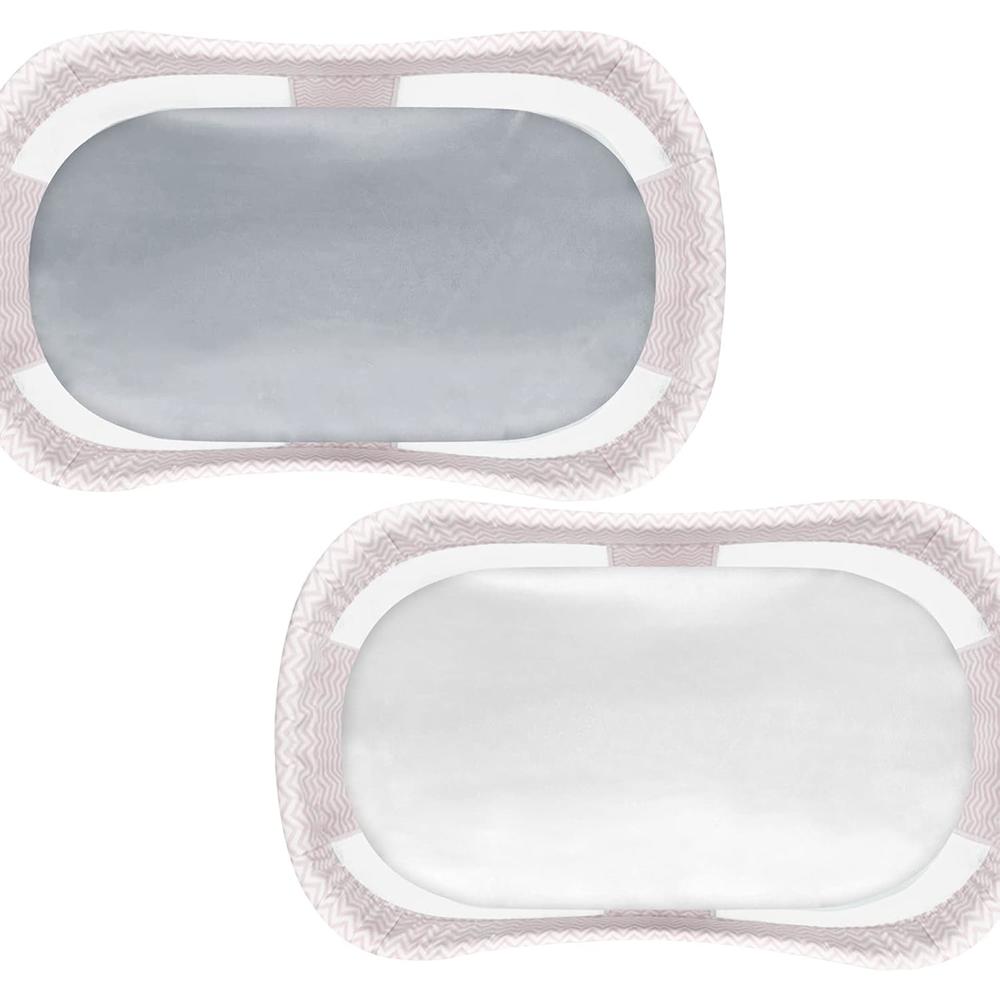 Two pads with pink patterned border, gray inner pad and white pad, likely sanitary pads or nursing pads.
