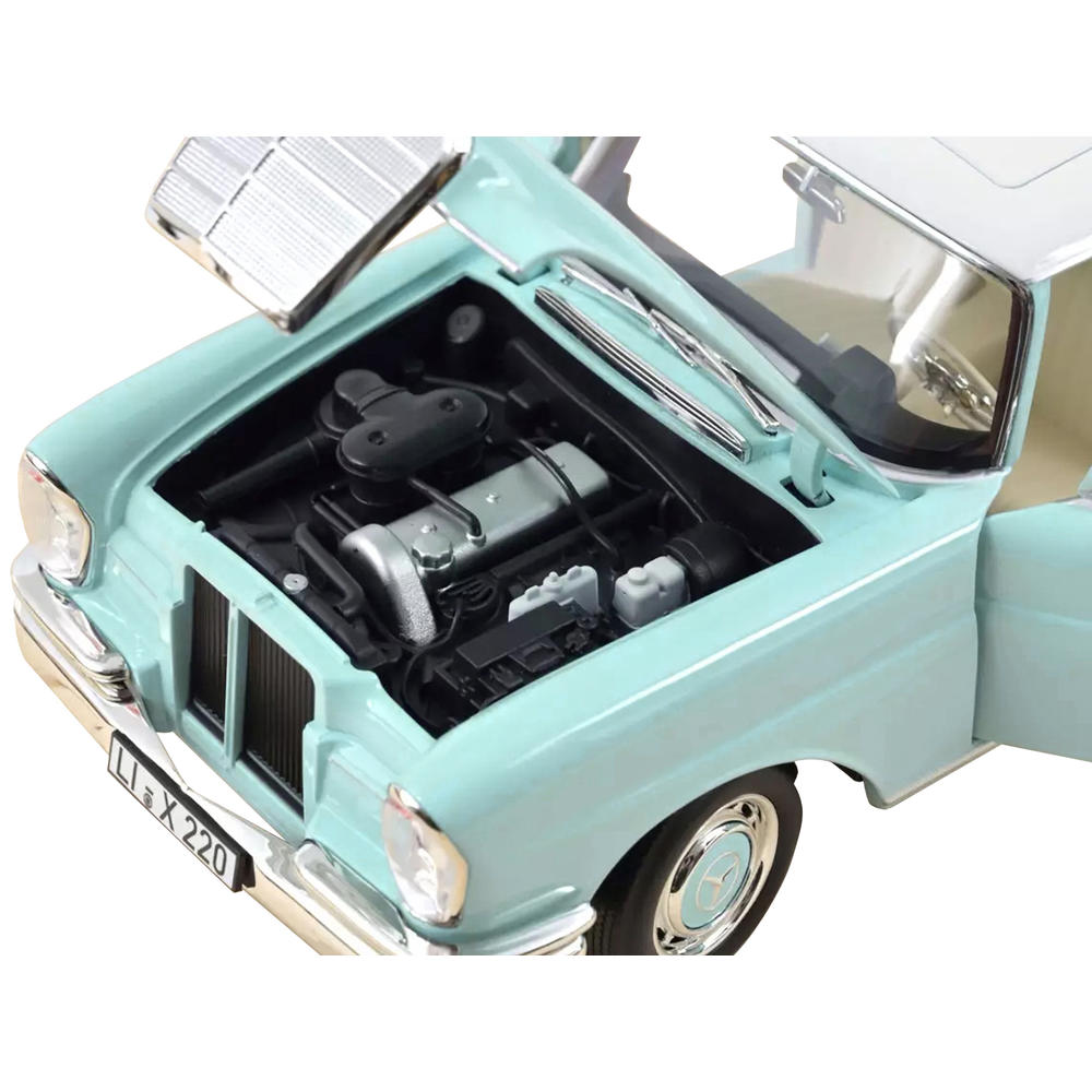 Norev 1/18 Bleu Clair Modèle Réduit NOREV Mercedes-Benz 220 S Norev 1/18 Bleu Clair Modèle Réduit NOREV Mercedes-Benz 220 S