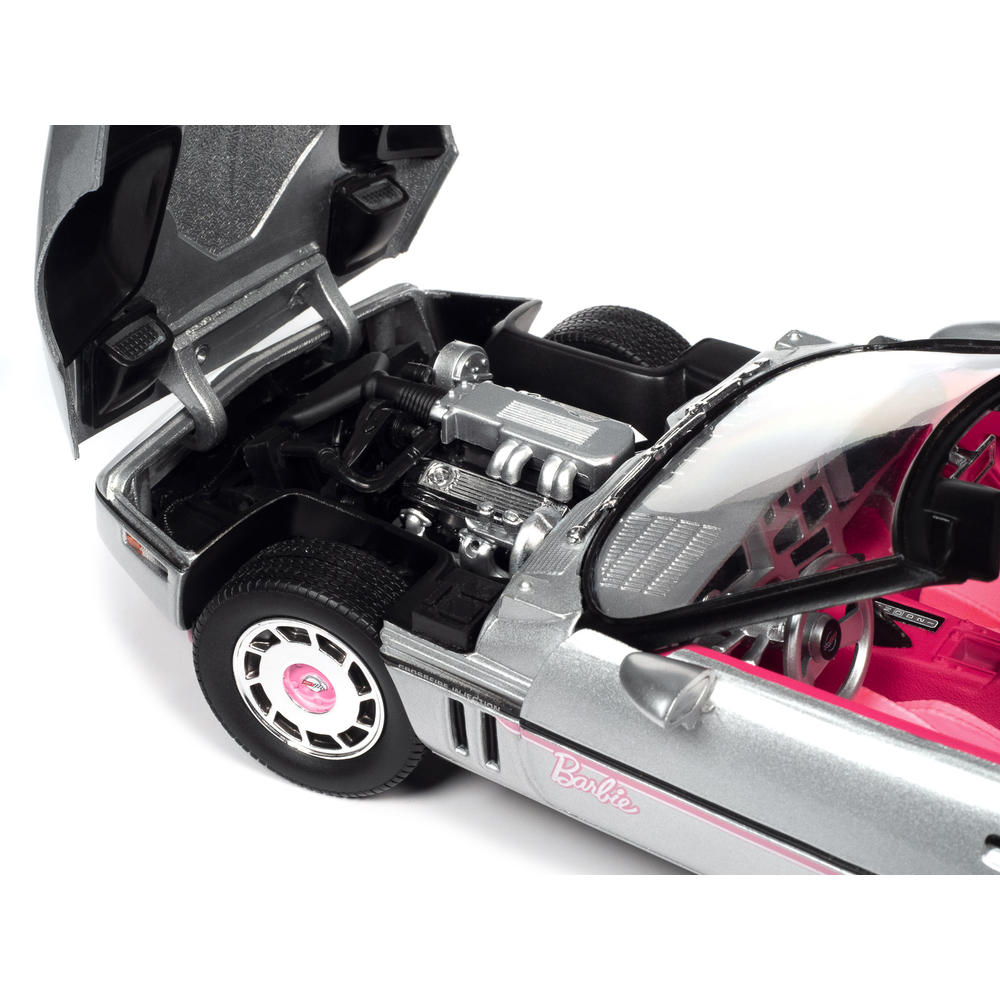 Autoworld 1986 Chevrolet Corvette Convertible Silver Metallic with Pink Ine" "Silver Screen Machines" 1/18 Diecast Model Car by Auto World