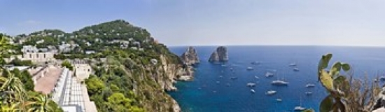 Panoramic Images PPI125803L Boats in the sea  Faraglioni  Capri  Naples  Campania  Italy Poster Print by Panoramic Images - 36 x 12
