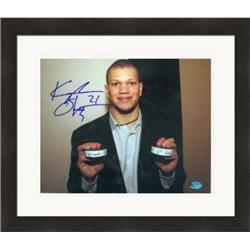 Autograph Warehouse 433006 8 x 10 in. Kyle Okposo Autographed Photo No. SC4 First NHL Goal Matted & Framed for New York Islanders