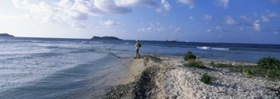 RLM Distribution Tourist fishing on the beach  Sandy Cay  Carriacou  Grenada Poster Print by  - 36 x 12