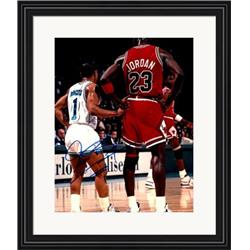 Autograph Warehouse 713915 8 x 10 in. Muggsy Bogues Autographed Charlotte Hornets Pictured Against Michael Jordan No.SC5 Matted & Framed Photo