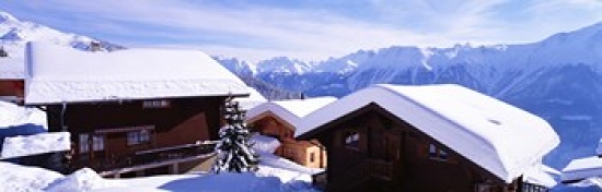 RLM Distribution Snow Covered Chapel and Chalets Swiss Alps Switzerland Poster Print by  - 36 x 12