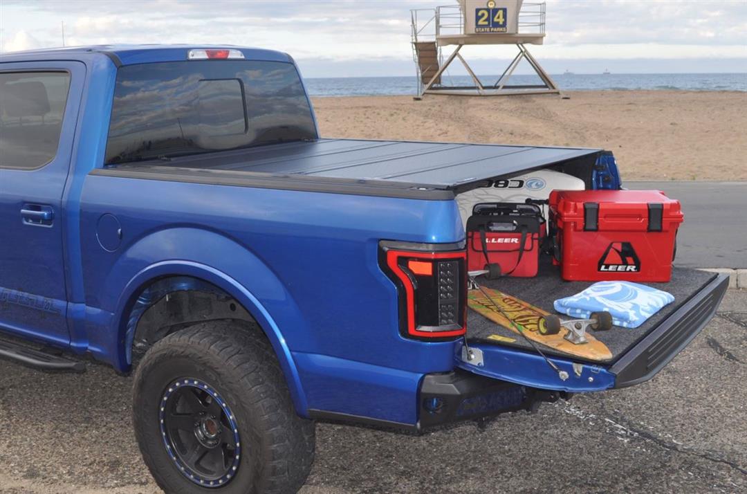 LEER HF650M   Fits 2008-2016 Ford Superduty with 6.9 FT Bed   Hard, Quad-Folding, Low Profile Tonneau Cover   SKU 650149