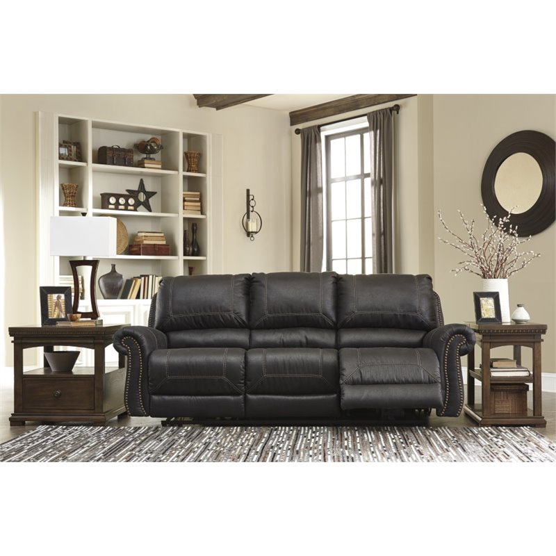 Ashley Milhaven Power Reclining Faux Leather Sofa In Black Ashley Milhaven Power Reclining Faux Leather Sofa In Black