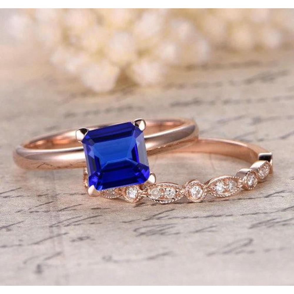 JeenJewels 1.75 Carat 6mm Princess Cut Blue Sapphire And Moissanite Diamond Halo Bridal Set in 10k Rose Gold