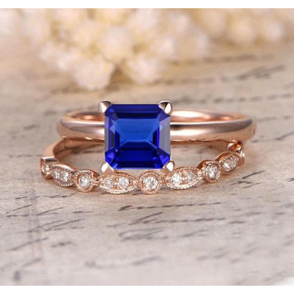 JeenJewels 1.75 Carat 6mm Princess Cut Blue Sapphire And Moissanite Diamond Halo Bridal Set in 10k Rose Gold