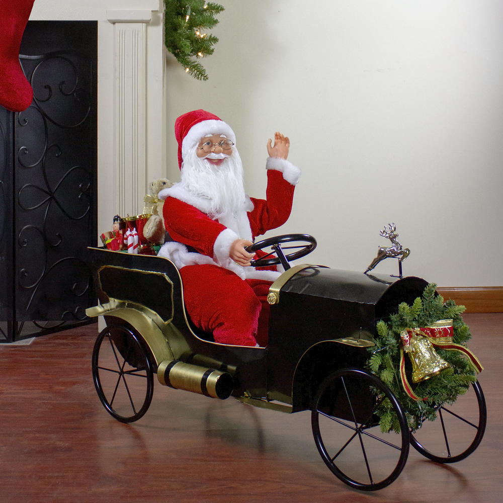 Northlight 33" Santa Delivering Presents in a Black and Gold Vintage Car Christmas Decoration