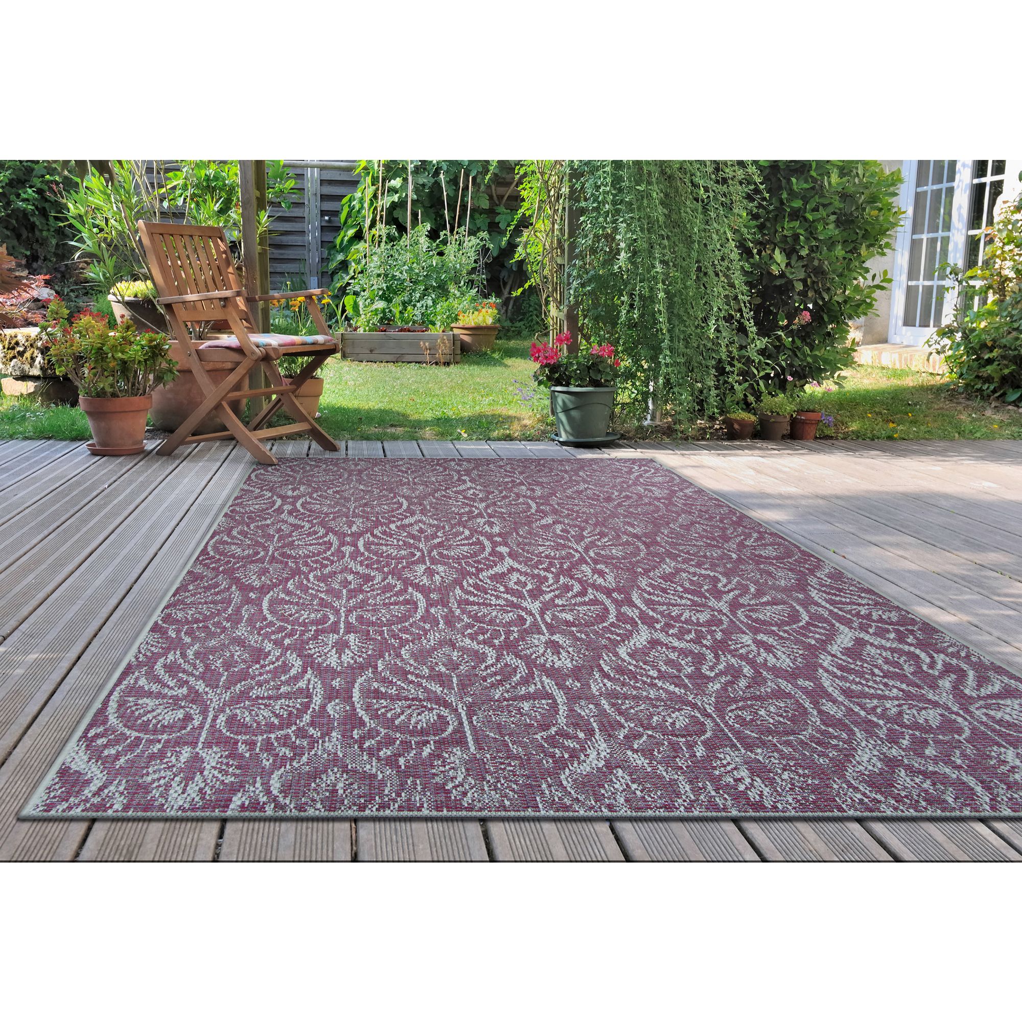 Couristan 5.25' x 7.5' Purple and Ivory Floral Rectangular Outdoor Area Throw Rug